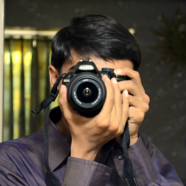 me with camera in front of mirror